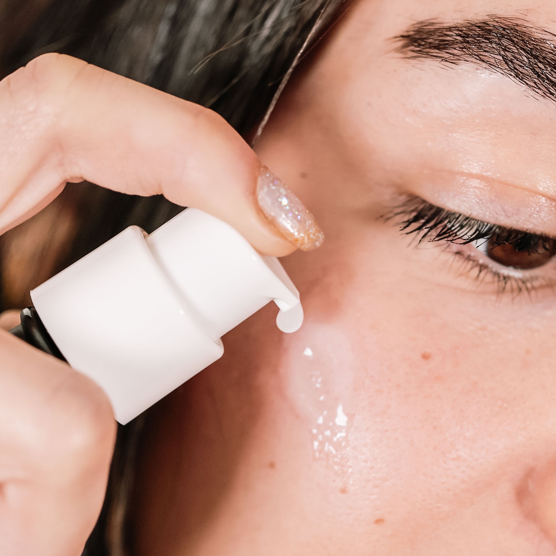Emu Oil Serum Lightweight Fragrance Free being applied to sensitive skin on a person&