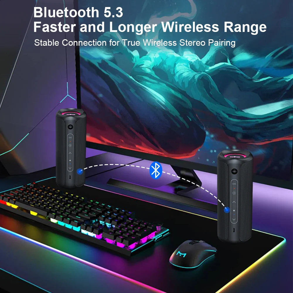 P3 Portable Bluetooth Speaker on a desk with a colorful keyboard, showcasing Bluetooth 5.3 for stable wireless connection.