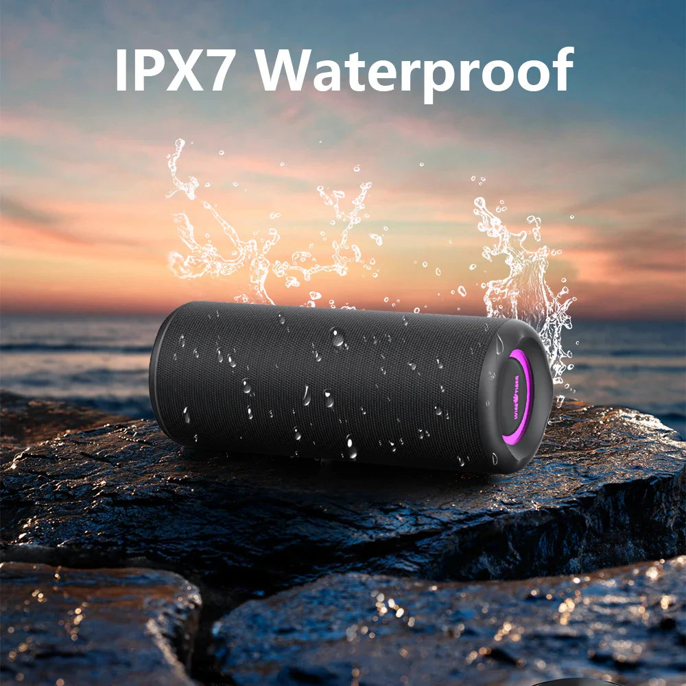 P3 Portable Bluetooth Speaker on a rocky surface, showcasing its IPX7 waterproof feature with water splashes.