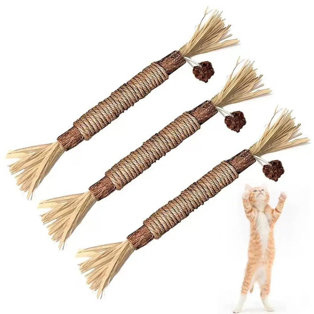 Three natural cat dental sticks with frayed ends and a textured surface, designed for dental health and play.