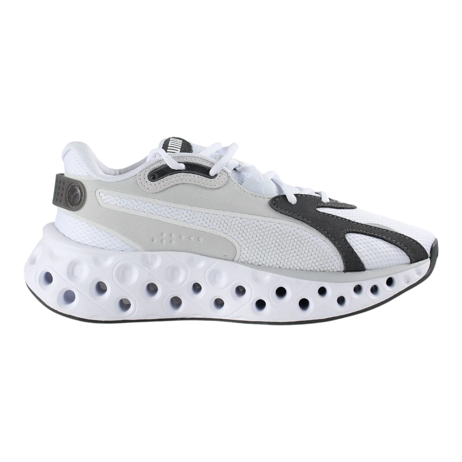 Puma Softride Frequence Men Running Shoes in white and feather gray with a unique cushioned sole design.