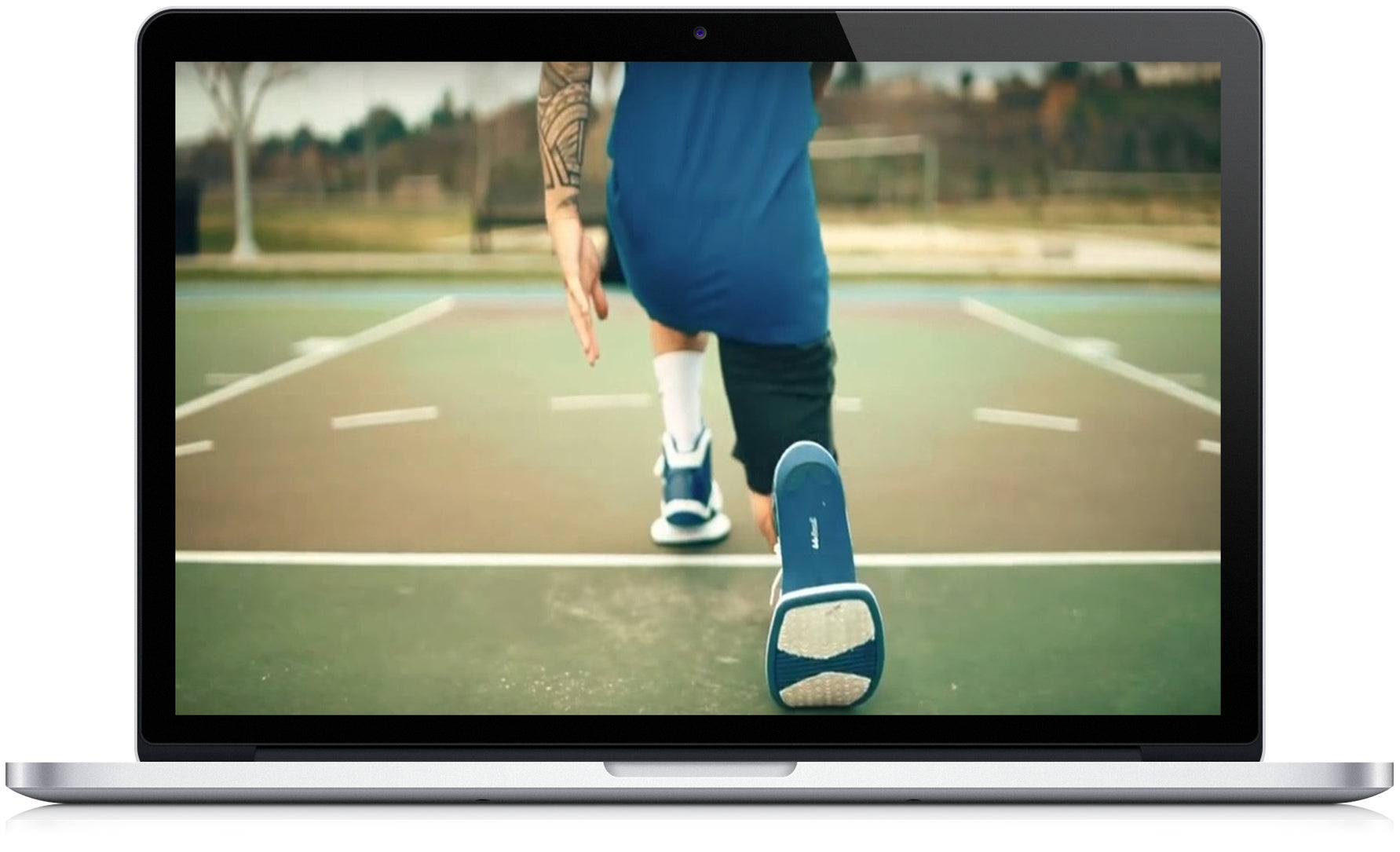 Jump 99 Training Shoes manual and videos displayed on a laptop, featuring a person running on a basketball court.