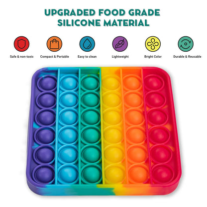 Colorful .4 Extra Rainbow Fidget Mat made of food-grade silicone, featuring pop bubbles in a grid layout. Safe, portable, and