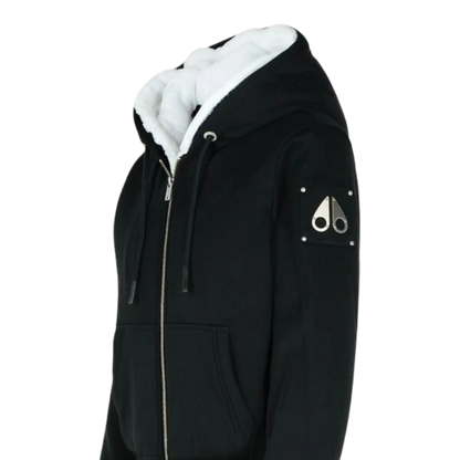 MOOSE KNUCKLES CLASSIC BUNNY MEN Zip-Up Hoodie in black with white fur lining and logo patch on the sleeve.