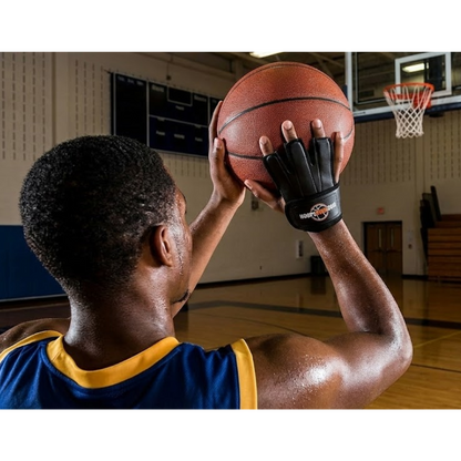 A player wearing the Perfect Jump Shot Glove prepares to shoot a basketball in a gym setting.