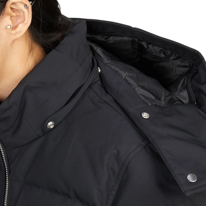 MOOSE KNUCKLES CLOUD BOMBER WOMEN Jacket in black, featuring a high collar and snap buttons on the shoulder.